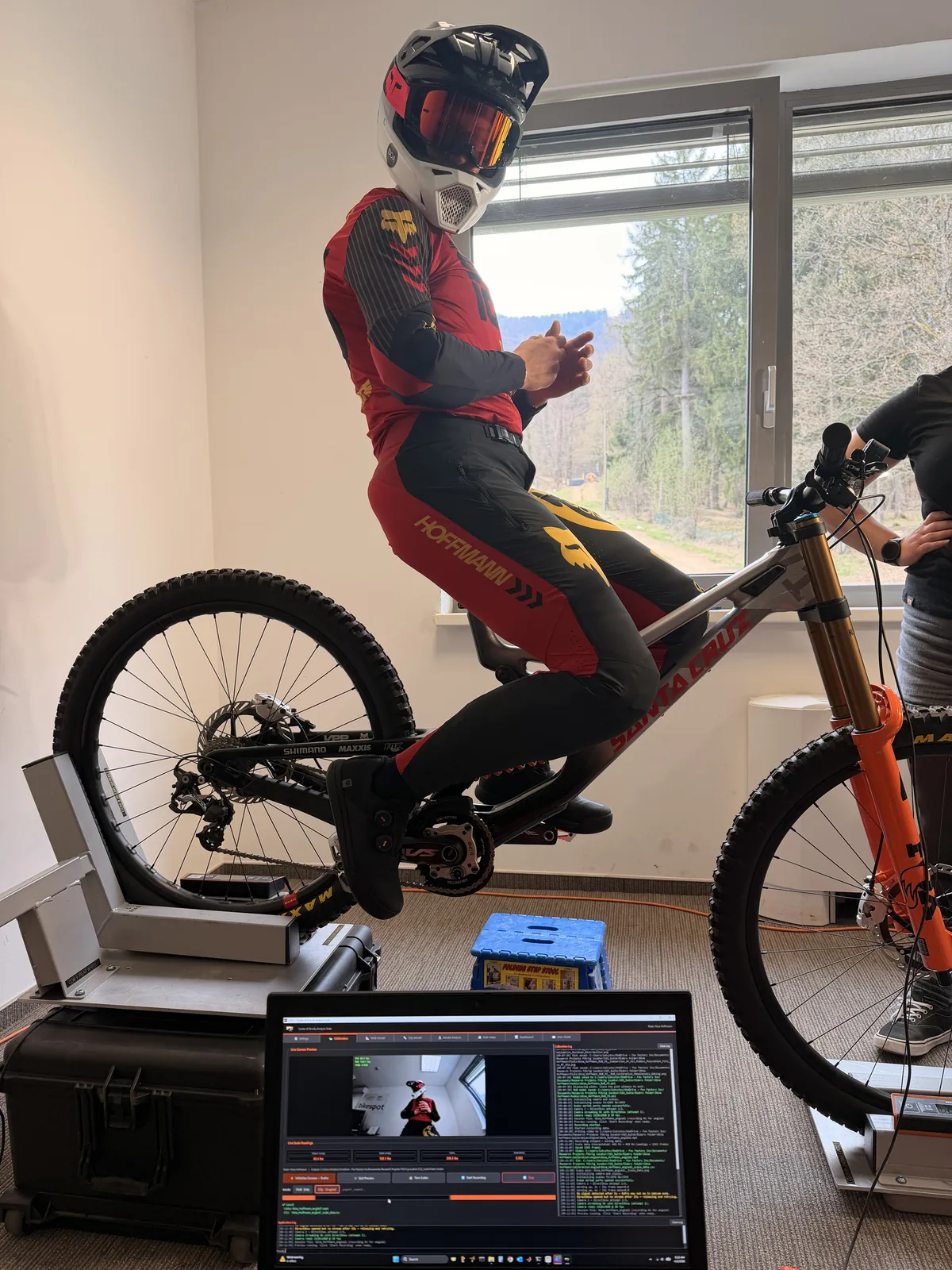 Rider on the wheel scales, rig tilted to simulate gradient.